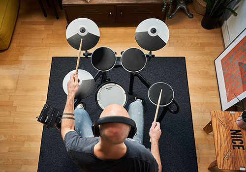Man playing digital drums