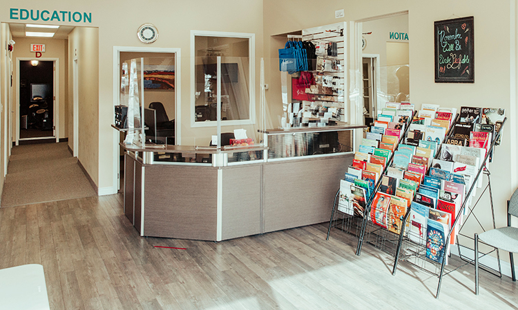Front desk lobby area with books on display